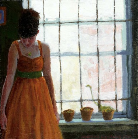 Woman in a dress next to a window