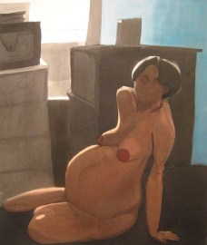 Nude pregnant woman lying on floor