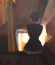 Woman sitting in a starewell
